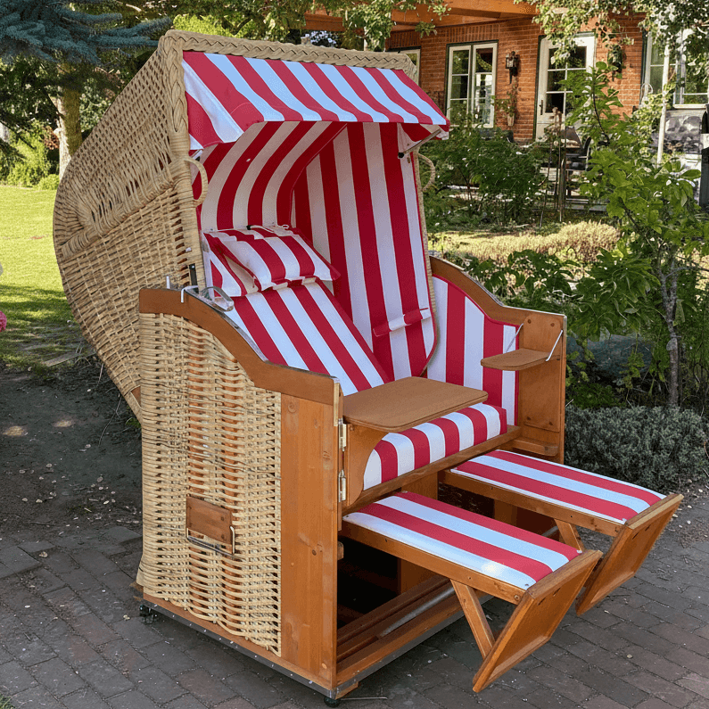 Strandkorb Sonnenpartner Classic PE Naturoptik mit rot weißem Dessin 30, Fahrrollen und Fußstützen im Garten
