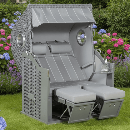 Strandkorb Sonnenpartner Classic PE Geflecht onix grau mit Bullaugen und Dessin 198, verstellbare Fußstützen im Garten auf Rasen