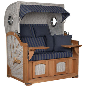 Strandkorb deVries Aruba XL mit blau-gestreiften Kissen und Kordel-Geflecht, ideal zum Entspannen im Freien.